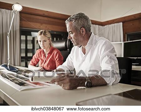 "Architects looking at a visualization of a draft, Innsbruck, Tyrol, Austria, Europe" View Large Photo Image Stock Photo - "Architects looking at a visualization of a draft, Innsbruck, Tyrol, Austria, Europe". Fotosearch