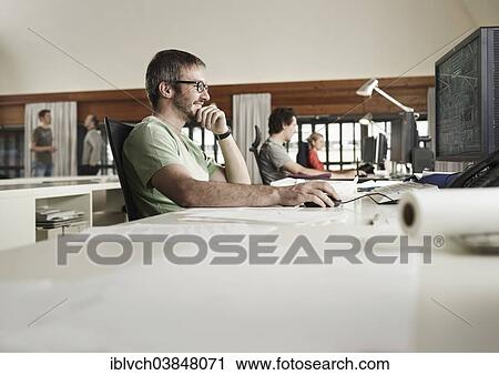 "Architects planning on a computer, Innsbruck, Tyrol, Austria, Europe" View Large Photo Image Stock Image - "Architects planning on a computer, Innsbruck, Tyrol, Austria, Europe". Fotosearch