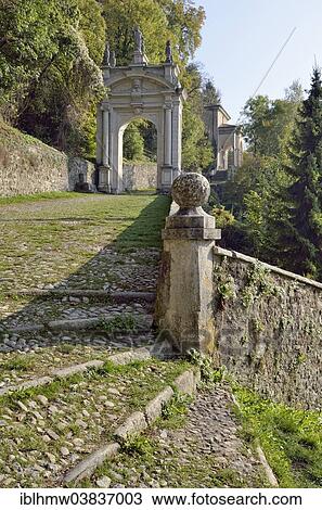 "Arco di San Ambrosio arch and Chapel XI, historic pilgrimage route to the Sanctuary of Santa Maria del Monte on the Sacro Monte di Varese or Sacred Mount of Varese, UNESCO World Cultural Heritage Site, Varese, Lombardy, Italy, Europe" View Large Photo Image Stock Image - "Arco di San Ambrosio arch and Chapel XI, historic pilgrimage route to the Sanctuary of Santa Maria del Monte on the Sacro Monte di Varese or Sacred Mount of Varese, UNESCO World Cultural Heritage Site, Varese, Lombardy, Italy, Europe". Fotosearch
