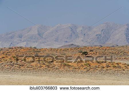 "Arid landscape with dunes and mountains, Khomas Region, Namibia, Africa" View Large Photo Image Stock Image - "Arid landscape with dunes and mountains, Khomas Region, Namibia, Africa". Fotosearch