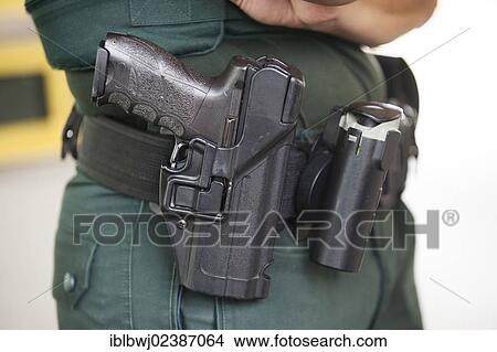 "Armed customs officer at immigration, customs control, Singen central customs office, branch office, border at Bietingen, Baden-Wuerttemberg, Germany, Europe" View Large Photo Image Picture - "Armed customs officer at immigration, customs control, Singen central customs office, branch office, border at Bietingen, Baden-Wuerttemberg, Germany, Europe". Fotosearch
