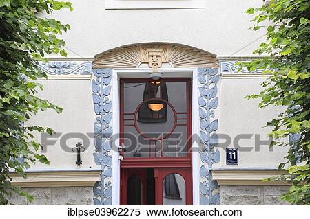 Stock Photography - "Art Nouveau entrance to the house Vidus iela 11, architect Konstantins Peksens, Riga, Latvia, Europe". Fotosearch