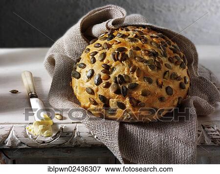 Artisan organic pumpkin seed bread loaf View Large Photo Image Stock Photo - Artisan organic pumpkin seed bread loaf. Fotosearch