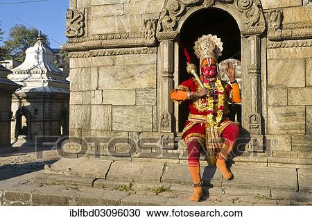 "Artist, dressed as God Haniuman, posing at the burning ghats, Kathmandu, Kathmandu District, Bagmati Zone, Nepal, Asia" View Large Photo Image Stock Image - "Artist, dressed as God Haniuman, posing at the burning ghats, Kathmandu, Kathmandu District, Bagmati Zone, Nepal, Asia". Fotosearch
