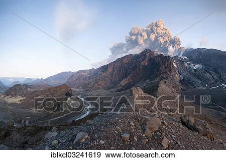 Stock Photo - "Ash cloud from Eyjafjallajoekull volcano above a glacier and Porsmoerk valley, Eyjafjallajokull, Iceland, Europe". Fotosearch