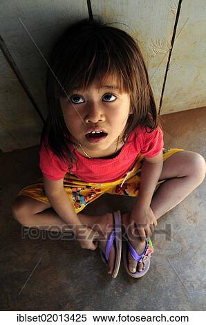 "Asian girl looking up, Cambodia, Southeast Asia, Asia" View Large Photo Image Stock Photography - "Asian girl looking up, Cambodia, Southeast Asia, Asia". Fotosearch