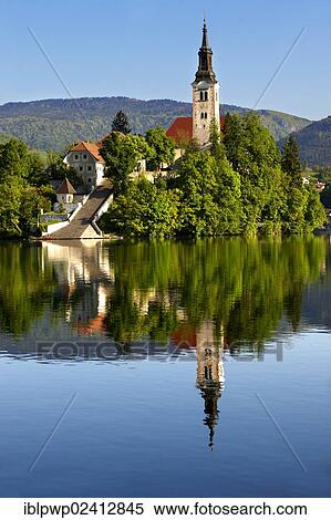 Assumption of Mary Pilgrimage Church in the middle of Lake Bled, Slovenia, Europe View Large Photo Image Stock Photography - Assumption of Mary Pilgrimage Church in the middle of Lake Bled, Slovenia, Europe. Fotosearch