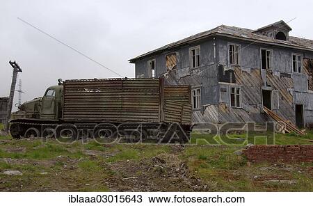 "AT-T caterpillar all-terrain vehicle in front of a derelict house in a rural locality, Dalniye Zelentsy, Kola Peninsula, Kolsky District, Murmansk Oblast, Russia, Europe" View Large Photo Image Stock Image - "AT-T caterpillar all-terrain vehicle in front of a derelict house in a rural locality, Dalniye Zelentsy, Kola Peninsula, Kolsky District, Murmansk Oblast, Russia, Europe". Fotosearch
