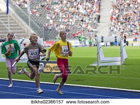 "Athletic children of Berlin schools taking part in a running competition at the ISTAF 2012 at the Olympic Stadium, Berlin, Germany, Europe" View Large Photo Image Stock Photo - "Athletic children of Berlin schools taking part in a running competition at the ISTAF 2012 at the Olympic Stadium, Berlin, Germany, Europe". Fotosearch