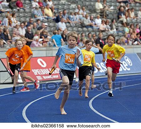 "Athletic children of Berlin schools taking part in a running competition at the ISTAF 2012 at the Olympic Stadium, Berlin, Germany, Europe" View Large Photo Image Stock Photo - "Athletic children of Berlin schools taking part in a running competition at the ISTAF 2012 at the Olympic Stadium, Berlin, Germany, Europe". Fotosearch