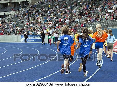 "Athletic children of Berlin schools taking part in a running competition at the ISTAF 2012 at the Olympic Stadium, Berlin, Germany, Europe" View Large Photo Image Stock Photo - "Athletic children of Berlin schools taking part in a running competition at the ISTAF 2012 at the Olympic Stadium, Berlin, Germany, Europe". Fotosearch