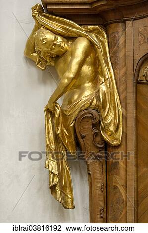 "Atlas figure at the confessional, by Bartholomew Zwinck, baroque Church of the Assumption of St. Mary, Ettal Abbey, Ettal, Upper Bavaria, Bavaria, Germany, Europe" View Large Photo Image Stock Image - "Atlas figure at the confessional, by Bartholomew Zwinck, baroque Church of the Assumption of St. Mary, Ettal Abbey, Ettal, Upper Bavaria, Bavaria, Germany, Europe". Fotosearch