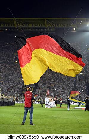 "Atmospheric choreography with flag-wavers, Signal Iduna Park, North Rhine-Westphalia, Germany, Europe" View Large Photo Image Stock Image - "Atmospheric choreography with flag-wavers, Signal Iduna Park, North Rhine-Westphalia, Germany, Europe". Fotosearch