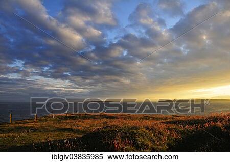 "Atmospheric clouds at sunset near Hoxa Head, South Ronaldsay, Orkney, Scotland, United Kingdom, Europe" View Large Photo Image Stock Photography - "Atmospheric clouds at sunset near Hoxa Head, South Ronaldsay, Orkney, Scotland, United Kingdom, Europe". Fotosearch