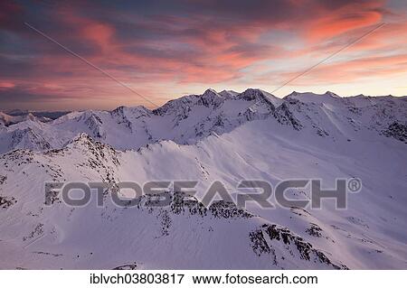 Stock Photo - "Atmospheric clouds over Obergurgl, Otztal Alps, Tyrol, Austria, Europe". Fotosearch