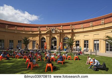 "Audience at the annual Poetry Festival in the Castle Garden in front of the Orangery, Erlangen, Middle Franconia, Bavaria, Germany, Europe" View Large Photo Image Stock Photography - "Audience at the annual Poetry Festival in the Castle Garden in front of the Orangery, Erlangen, Middle Franconia, Bavaria, Germany, Europe". Fotosearch