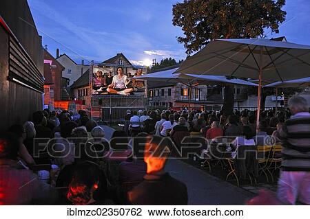 "Audience at the open air cinema, Lauf industrial museum, Sichartstrasse street 5-25, Lauf, Middle Franconia, Bavaria, Germany, Europe" View Large Photo Image Stock Image - "Audience at the open air cinema, Lauf industrial museum, Sichartstrasse street 5-25, Lauf, Middle Franconia, Bavaria, Germany, Europe". Fotosearch