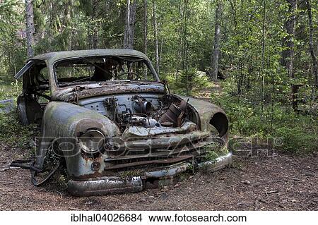 "Auto graveyard in the forest, junk car, Kyrko Mosse, near Ryd, Smaland, Sweden, Europe" View Large Photo Image Picture - "Auto graveyard in the forest, junk car, Kyrko Mosse, near Ryd, Smaland, Sweden, Europe". Fotosearch