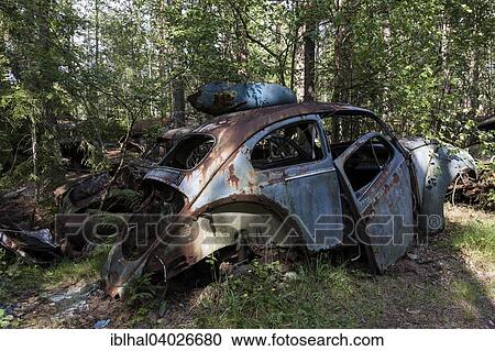 "Auto graveyard in the forest, junk car, Kyrko Mosse, near Ryd, Smaland, Sweden, Europe" View Large Photo Image Stock Image - "Auto graveyard in the forest, junk car, Kyrko Mosse, near Ryd, Smaland, Sweden, Europe". Fotosearch