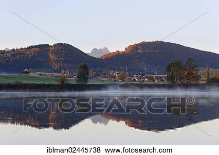 Stock Photo - "Autumn morning at Huttlerweiher pond, Rosshaupten, Ostallgaeu, Allgaeu, Swabia, Bavaria, Germany, Europe". Fotosearch