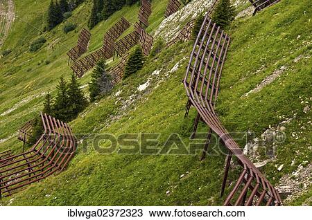 Stock Image - "Avalanche barriers, Walmendingerhorn mountain, Allgaeu Alps, Vorarlberg, Austria, Europe, PublicGround, Europe". Fotosearch