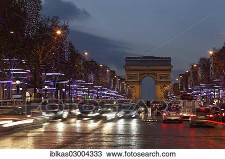 "Avenue des Champs-Elysees with the Arc de Triomphe, Christmas lights, evening mood, Paris, Ile-de-France, France, Europe" View Large Photo Image Stock Image - "Avenue des Champs-Elysees with the Arc de Triomphe, Christmas lights, evening mood, Paris, Ile-de-France, France, Europe". Fotosearch