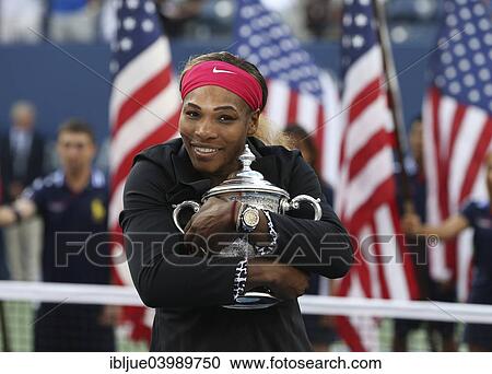 Stock Image - "Award ceremony, champion Serena Williams, United States, with trophy, U. S. Open 2014, ITF Grand Slam Tennis Tournament, USTA Billie Jean King National Tennis Center, Flushing Meadows, New York, United States, North America". Fotosearch