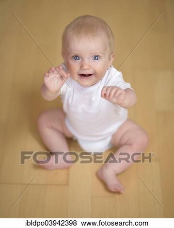 "Baby, 7 months, excited" View Large Photo Image Stock Photo - "Baby, 7 months, excited". Fotosearch