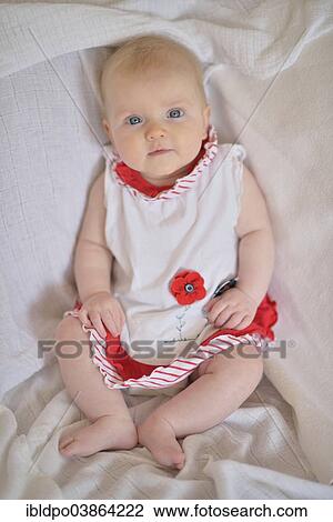 Baby Girl 4 Months Wearing A Dress Stock Image Ibldpo Fotosearch