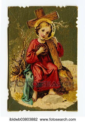 Stock Image - "Baby Jesus holding a cross wearing a crown of thorns, devotional image, Bavaria, Germany, Europe". Fotosearch