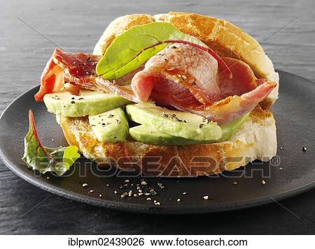 Stock Photograph - Bacon and avacado sandwich. Fotosearch
