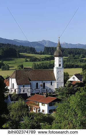 "Bad Bayersoien with the parish church of St. George, Pfaffenwinkel region, Upper Bavaria, Bavaria, Germany, Europe, PublicGround, Europe" View Large Photo Image Stock Photo - "Bad Bayersoien with the parish church of St. George, Pfaffenwinkel region, Upper Bavaria, Bavaria, Germany, Europe, PublicGround, Europe". Fotosearch