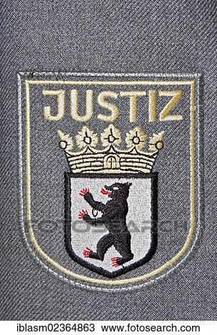 Stock Image - "Badge, lettering """"Justiz"""", German for """"legal authority"""", coat of arms of Berlin, Courts of Berlin, Berlin, Germany, Europe". Fotosearch