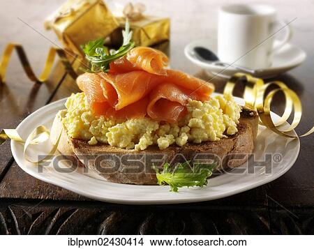 Bagel with scrambled eggs and smoked salmon View Large Photo Image Picture - Bagel with scrambled eggs and smoked salmon. Fotosearch