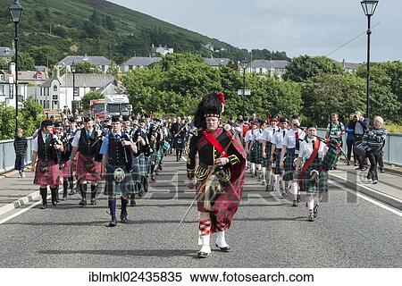 Stock Photography - "Bagpipe parade, Helmsdale Highland Games, Helmsdale, Sutherland, Scotland, United Kingdom, Europe". Fotosearch