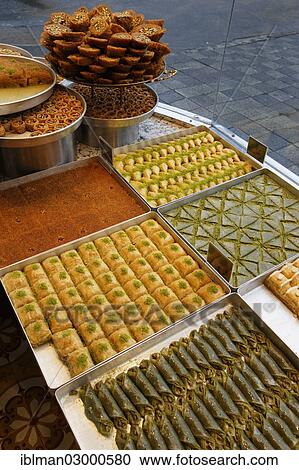 Stock Image - "Baklava and other Turkish sweets in the shop window of Hafiz Mustafa, Istanbul, Turkey, Europe, Istanbul, Istanbul Province, Turkey, Asia". Fotosearch