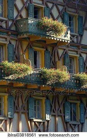 Stock Image - "Balconies, flower boxes with Geraniums (Pelargonium sp. ), Schlosshotel Linderhof, Schloss Linderhof Palace, Upper Bavaria, Bavaria, Germany, Europe". Fotosearch