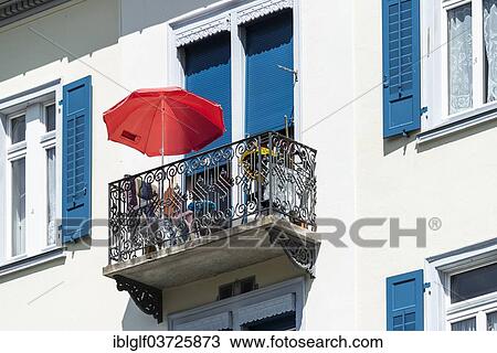 "Balcony with a sun umbrella, Pontresina, Canton of Graubunden, Switzerland, Europe" View Large Photo Image Stock Image - "Balcony with a sun umbrella, Pontresina, Canton of Graubunden, Switzerland, Europe". Fotosearch