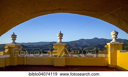 "Balcony with columns, view from the bell tower of the church Convento de San Francisco de Asis onto the landscape around Trinidad, Trinidad, Cuba, North America" View Large Photo Image Stock Photo - "Balcony with columns, view from the bell tower of the church Convento de San Francisco de Asis onto the landscape around Trinidad, Trinidad, Cuba, North America". Fotosearch