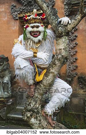 Stock Image - "Balinese Kecak dancer, Ubud, Bali, Indonesia, Asia". Fotosearch