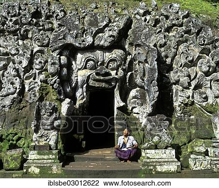 "Balinese man sitting at the entrance to the Goa Gajah or Elephant Cave, cave temple, Bedulu, Bali, Sudostasien, Indonesia, Asia" View Large Photo Image Stock Image - "Balinese man sitting at the entrance to the Goa Gajah or Elephant Cave, cave temple, Bedulu, Bali, Sudostasien, Indonesia, Asia". Fotosearch
