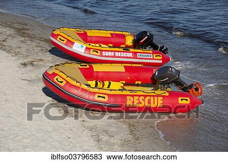 Stock Image - "Baltic Sea, beach and lifeboats of the German Life Saving Society, Prerow, Mecklenburg-Vorpommern, Germanyy". Fotosearch
