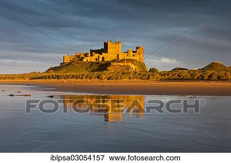 "Bamburgh Castle and its reflection in the last light of the day, Bamburgh, Northumberland, England, United Kingdom, Europe" View Large Photo Image Stock Photo - "Bamburgh Castle and its reflection in the last light of the day, Bamburgh, Northumberland, England, United Kingdom, Europe". Fotosearch