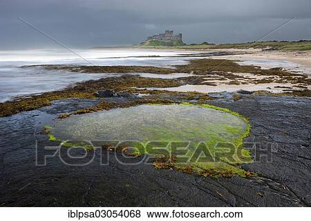 Stock Photo - "Bamburgh Castle during a storm, Bamburgh, Northumberland, England, United Kingdom, Europe". Fotosearch