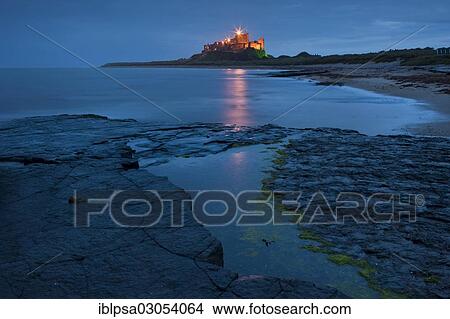 "Bamburgh Castle illuminated at dusk, Bamburgh, Northumberland, England, United Kingdom, Europe" View Large Photo Image Picture - "Bamburgh Castle illuminated at dusk, Bamburgh, Northumberland, England, United Kingdom, Europe". Fotosearch