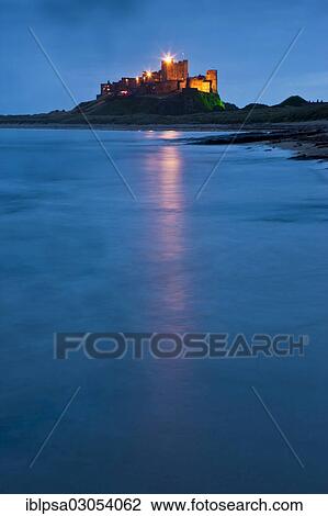 "Bamburgh Castle illuminated at dusk, Bamburgh, Northumberland, England, United Kingdom, Europe" View Large Photo Image Stock Image - "Bamburgh Castle illuminated at dusk, Bamburgh, Northumberland, England, United Kingdom, Europe". Fotosearch