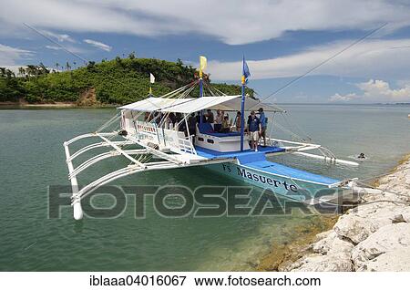 "Bangcara, a traditional Philippine outrigger canoe, Malapascua Island, Philippines, Asia" View Large Photo Image Stock Photo - "Bangcara, a traditional Philippine outrigger canoe, Malapascua Island, Philippines, Asia". Fotosearch