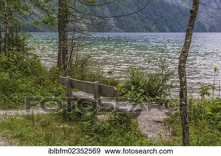 Stock Photo - "Bank at the Pilgrimage church of St. Bartholomew, Lake Koenigssee, Berchtesgaden, Berchtesgadener Land, Bavaria, Germany, Europe". Fotosearch