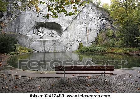 Bank in front of the Lion Monument, Lucerne, Canton of Lucerne, Switzerland, Europe View Large Photo Image Stock Photo - Bank in front of the Lion Monument, Lucerne, Canton of Lucerne, Switzerland, Europe. Fotosearch
