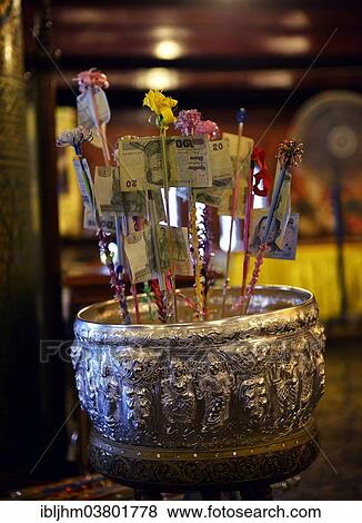 Stock Photo - "Bank notes as offerings, Wat Phra Si Rattana Mahathat Temple or Wat Yai Temple, Phitsanulok, Northern Thailand, Thailand, Asia". Fotosearch